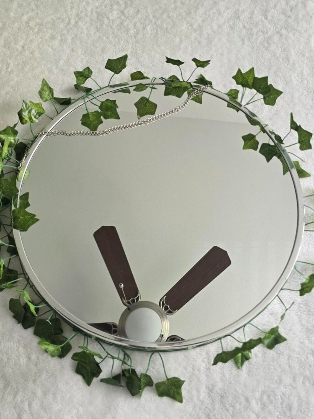 Faux ivy leaf circle mirror with chain detail